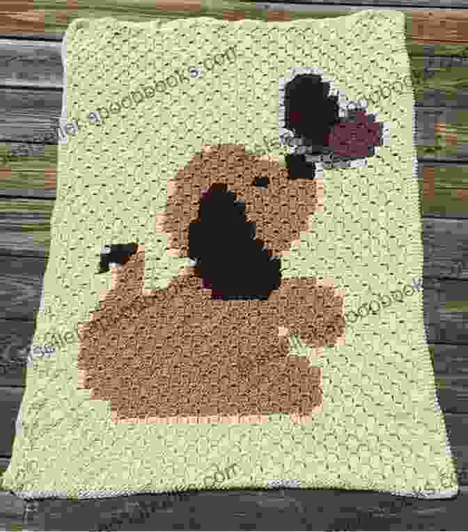 A Crocheted Puppy Cuddle Blanket With A Sleeping Puppy On Top Crochet Pattern Puppy Cuddle Blanket