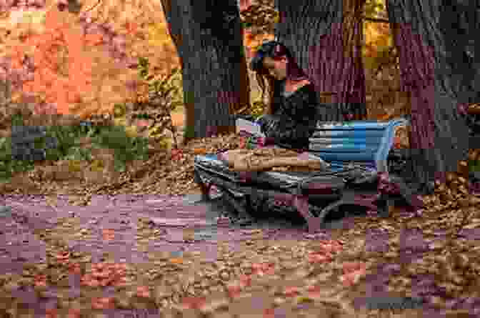 A Woman Sitting On A Bench In An Autumn Park, Reading A Book Of Poetry Autumn Poetry: A Collection For The Season