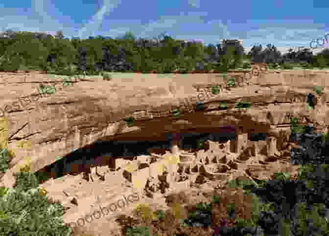 Ancient Pueblo Dwellings Nestled Into A Cliffside, Showcasing The Architectural Ingenuity Of The Pueblo People The Land Of The Pueblos