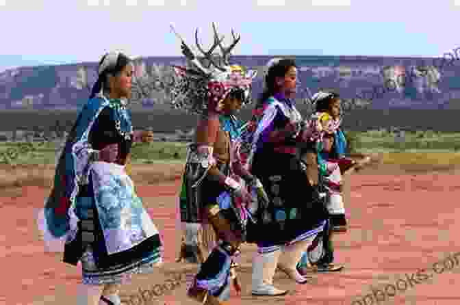 Pueblo Dancers Performing A Traditional Ceremony, Their Colorful Regalia And Rhythmic Movements Reflecting The Deep Connection To Their Culture And Spirituality The Land Of The Pueblos